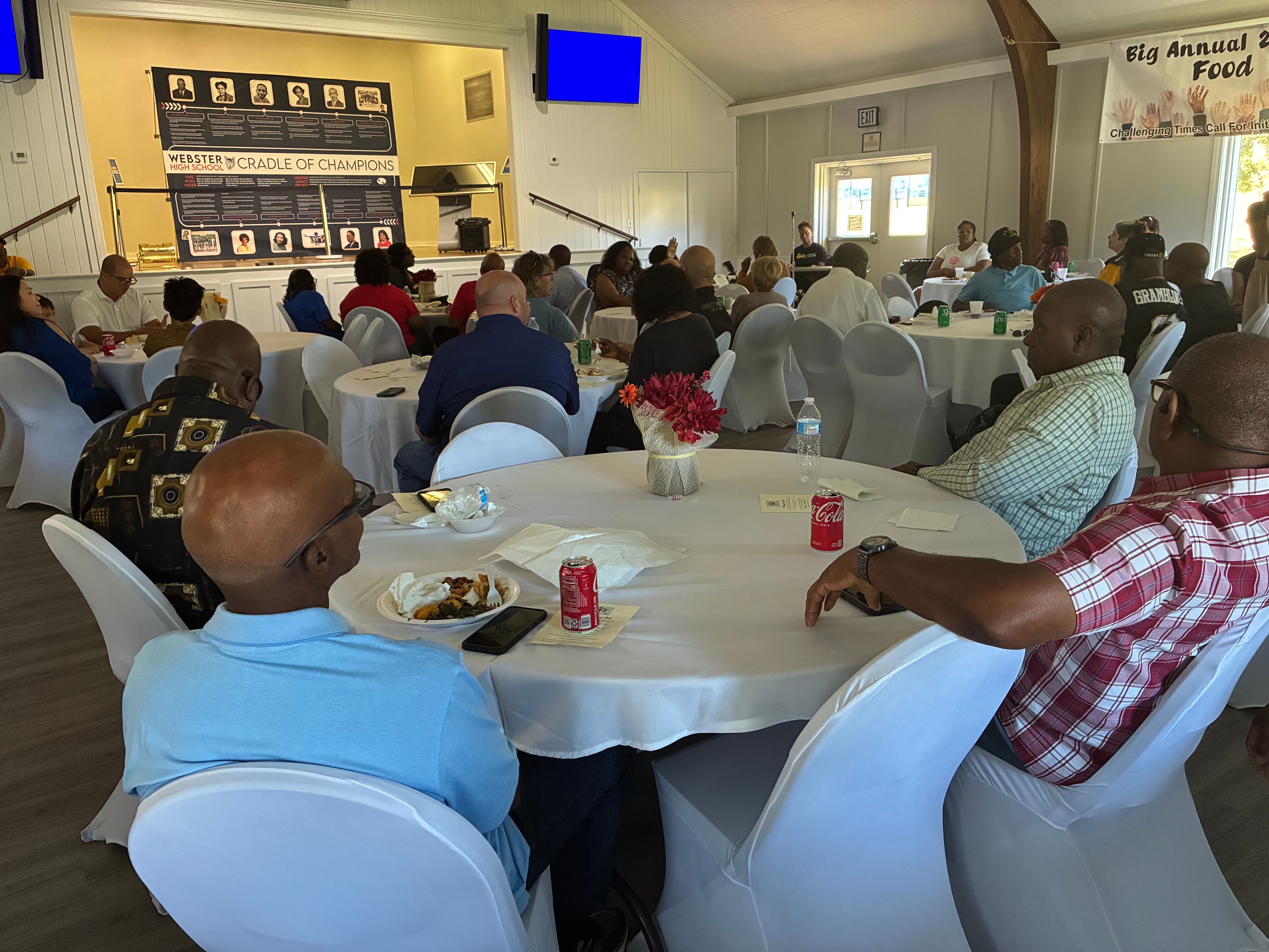 Wide view of Food Fest 2025 with Cradle of Champions banner